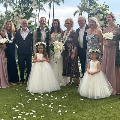 Wedding party gathered outdoors during the reception