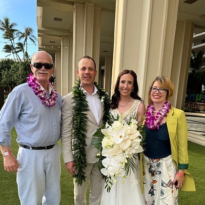 Couple and guests celebrating after the ceremony