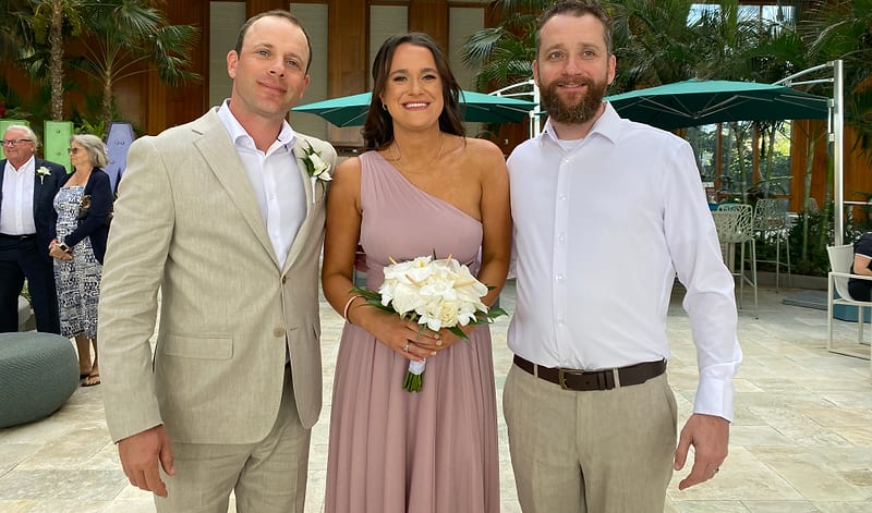 Couple celebrating with guests on the dance floor